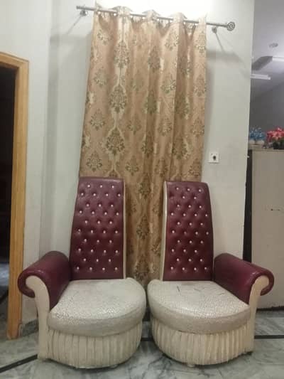two coffee chairs with coffee table one dewan