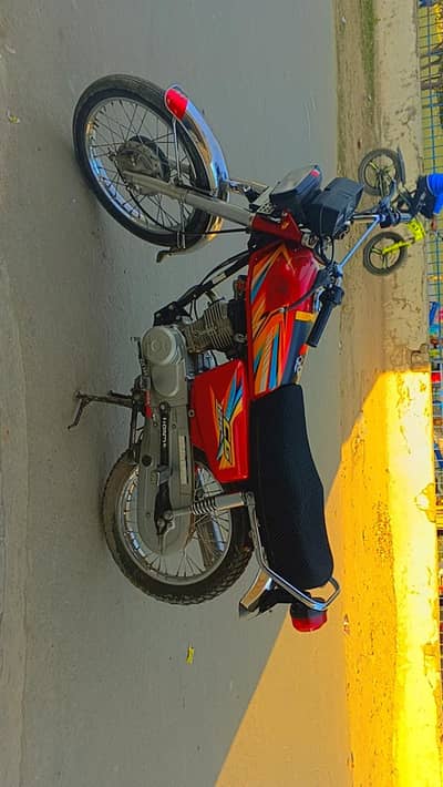 Honda 125 red colour 1st hand used