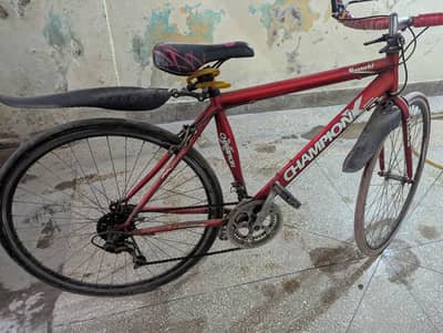 Champion X Sports Road Bike | 12-Speed | 27-Inch Tyres