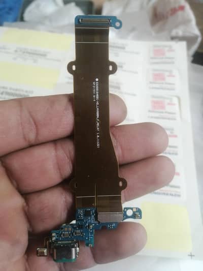 LG v60 charging strips or more parts