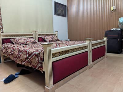 Two single beds in pure wood