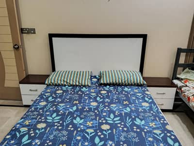 Queen size bed and cupboard