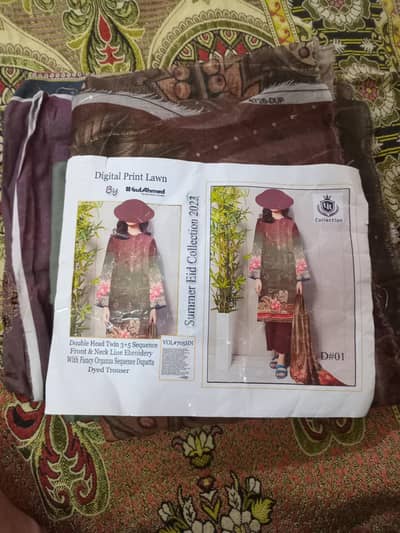 Lawn suits ladies unstitched eid collection .