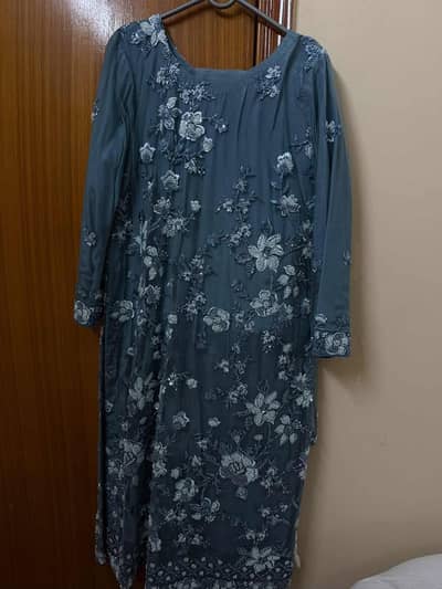 beautiful teal heavy embroidered net dress