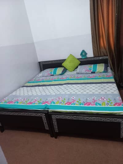2 single beds with mattress