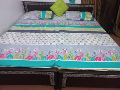 2 single beds with mattress