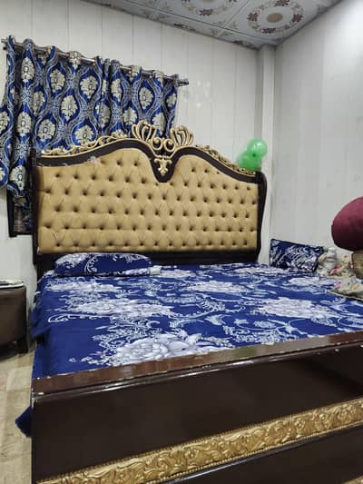 King size bed with side tables and dressing table