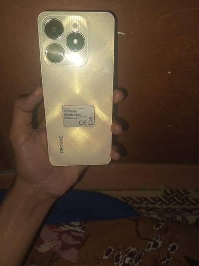 Realme c61 ram 6 GB storage 128  ceamra pixel 50   10 by 10 condition