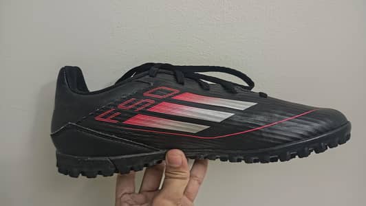 f50 turf shoe black and red