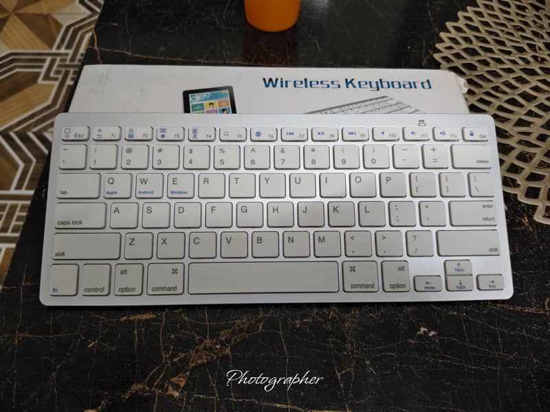 Mini Bluetooth Keyboard 0