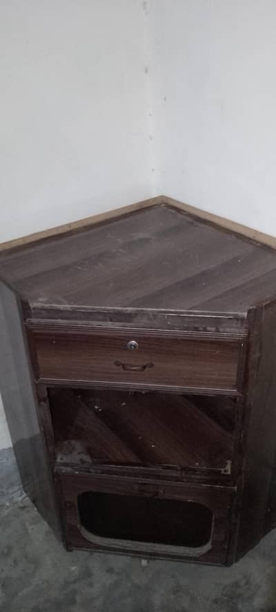 Beautiful new condition corner wooden Tv Trolly for sale. .