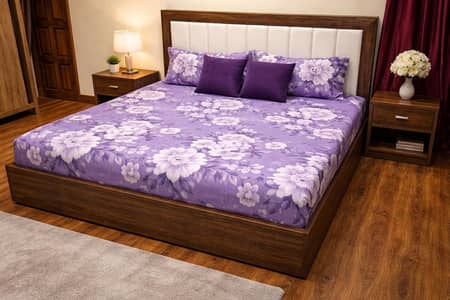 slightly used bed  with two side tables