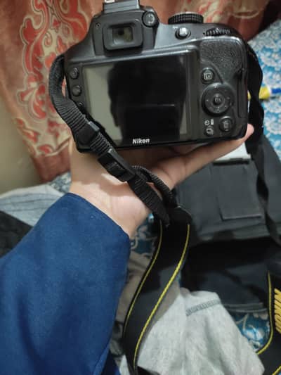 Nikon D3400 with Lens 18 by 55mm