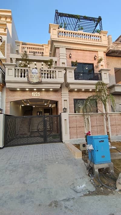 5 Marla Luxury House for Sale Your Dream Home Awaits!*  Located in a premium gated society with _all modern amenities_, this stunning 5 Marla residence is priced at *Rs:2.85 Cr* perfect for those who value elegance, comfort & status.