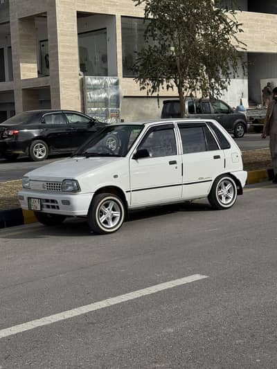 Mehran vxr 2018 model Phly lahore numbr tha ab punjb nbr ha mery name