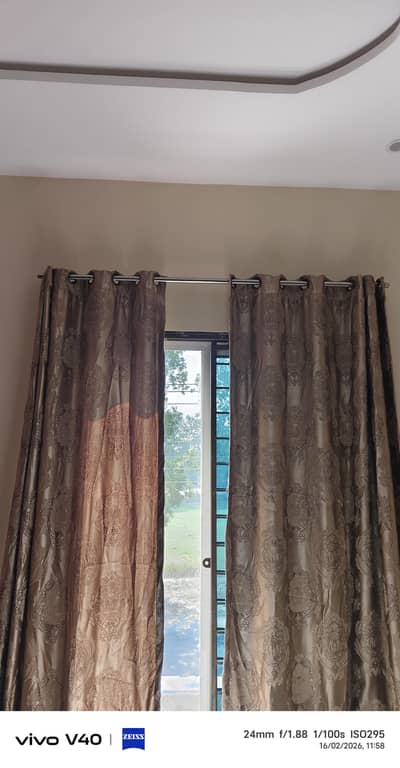 4 Fancy curtains with golden touch. 8 feet length and 4 feet width.