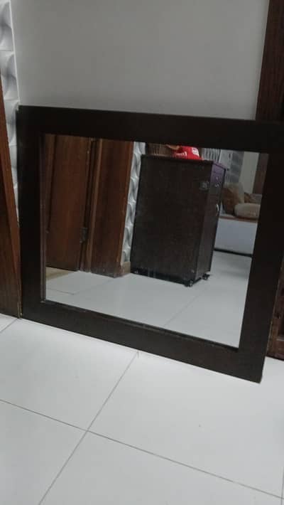 brown boarder mirror