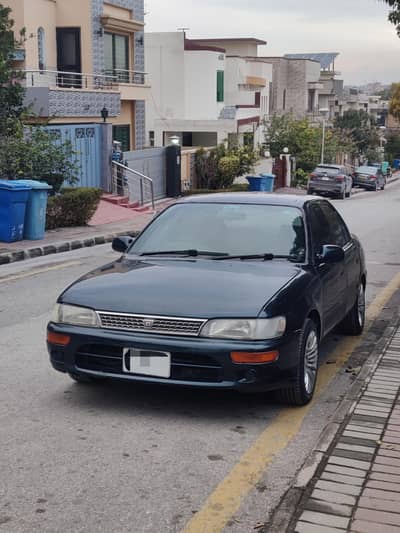 Toyota Corolla XE 1996/2001 Headlights with Grill