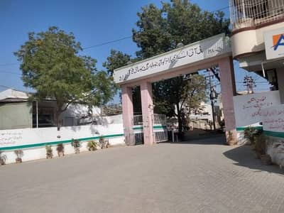 200 Yards West Open Corner Plot On 60 Ft Road Almost Facing Main Road In Boundary Walled PIA Society Block 9 Gulistan E Jauhar