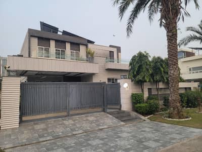 One Kanal Slightly Used Ultra Modern Designer Owner Build Fully Furnished Bungalow 2 Servant Quarter In Basement For Sale At Prime Location Of DHA Lahore Near To Park Masjid & Commercial Market.