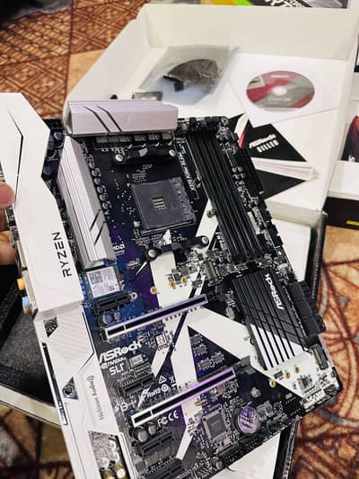 ASRock X370 Killer SLI/ac MotherBoard & XFX 750W Power Supply Gold