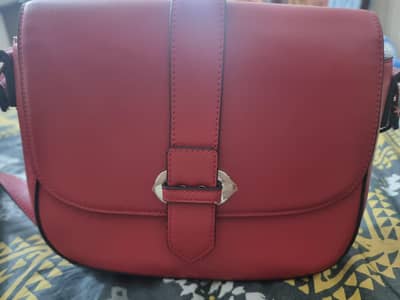 imported red hand bag
