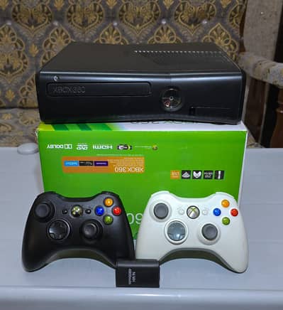 Xbox360Slim Jtagged 320GB with two wireless controllers and 80 games