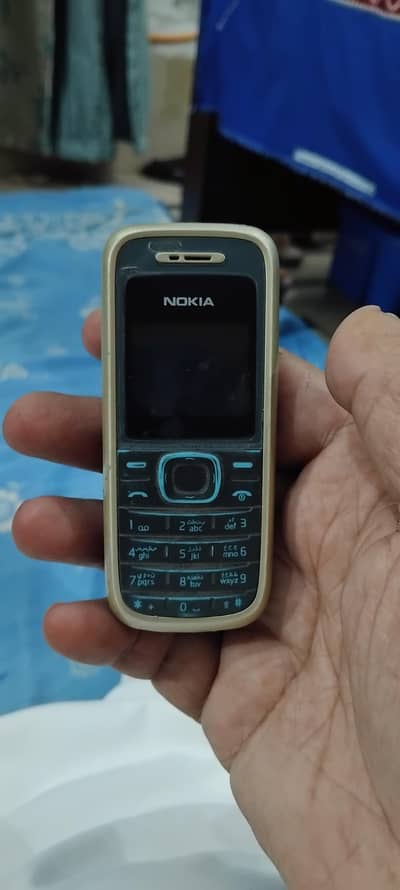 Nokia 1208 in good condition 100%genuine never opened or repaired