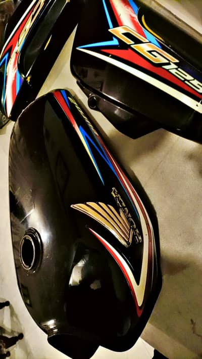 Honda 125 geniun Tanki tapay kaan