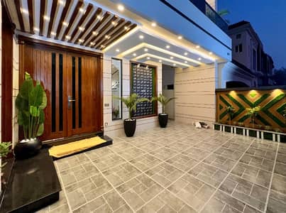 10 marla brand new house available for rent overseas B block Facing Park bahria town Lahore