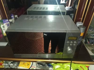 Haier microwave oven grill baking  2in1  03124268489