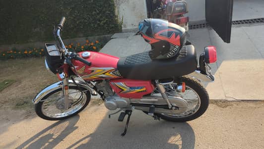 2025 125 urgent with vector helmet