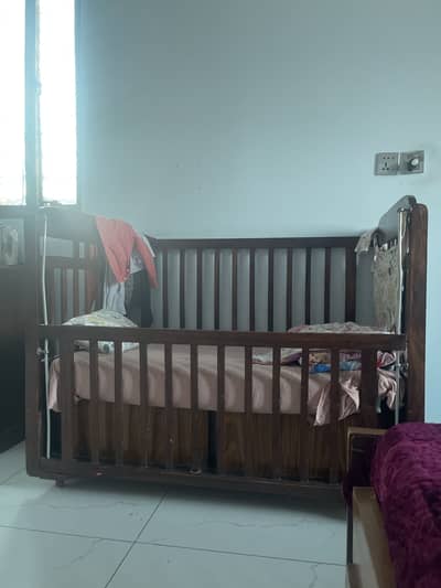 kids wooden cot in good condition