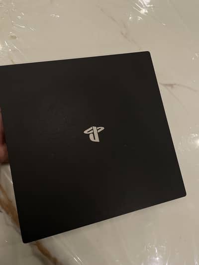 PS4 Pro [ 1 TB ] with games 9/10 condition