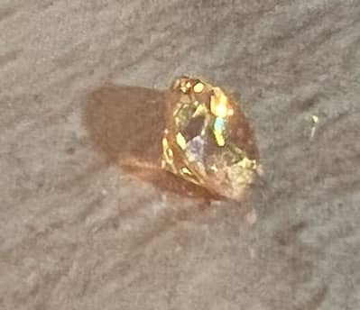 Natural Fancy Orangy Yellow 0.32Ct