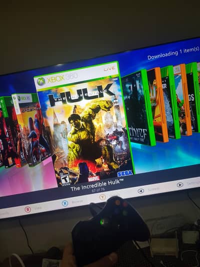 xbox 360 console + 76 games 1 controller  good condition deal