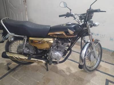 honda 125 spacial gold addition 2024 first owner on my name karachi .