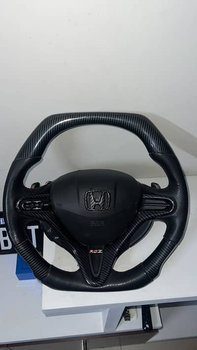 Carbon fibre steering wheel