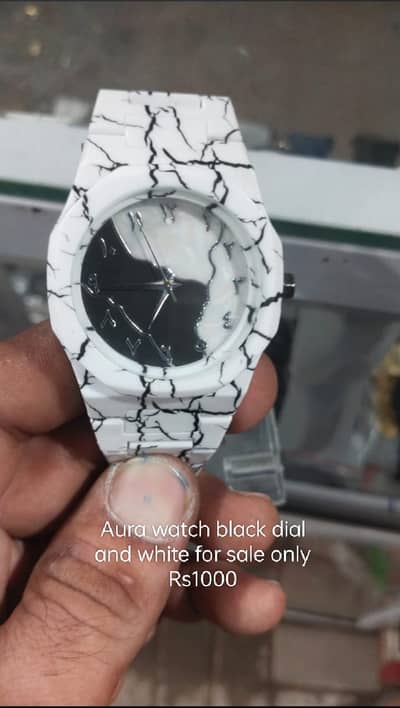 Aura watch marble dial black.
