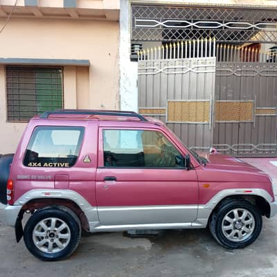 Beautiful Mitsubishi Pajero Mini, genuine inside outside shower for 55