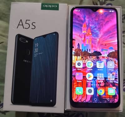 Oppo A5s with charger and box