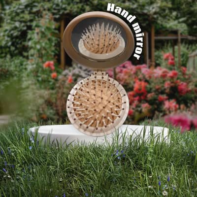 Hand mirror with Brush