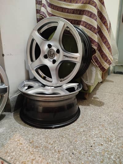 Alloy wheels 15 inches 6.5JJ pcd 100 4 nuts(only rims)
