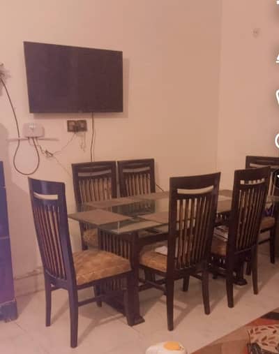 dining table with mats and chair included for sale 70k double glass