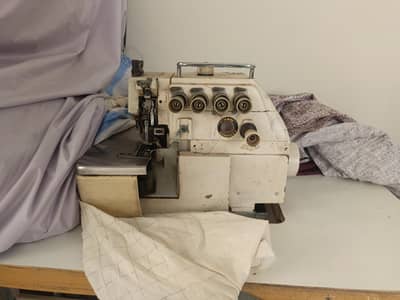 Double niddle dezining machine saruba