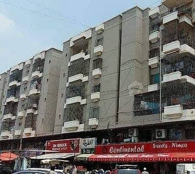 Apartment with for sale in DECENT TOWER main Safari Park Road continental Bakery near university road block 15 Gulistan e jauhar.