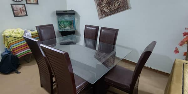 Glass Dining table with 6 leather chairs