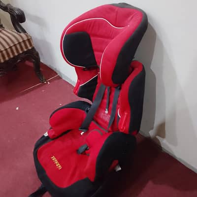 Used Ferrari-style baby car seat, good condition.