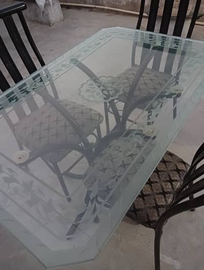 Glass table with iron chairs (4 seaters)