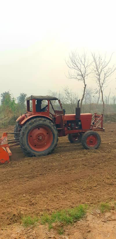 Old model tractor but very good condition.